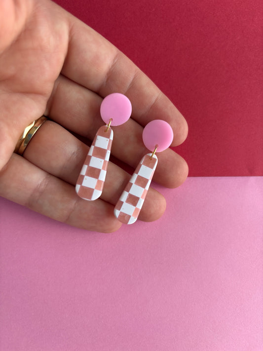 Checkered drop dangles: pink and white