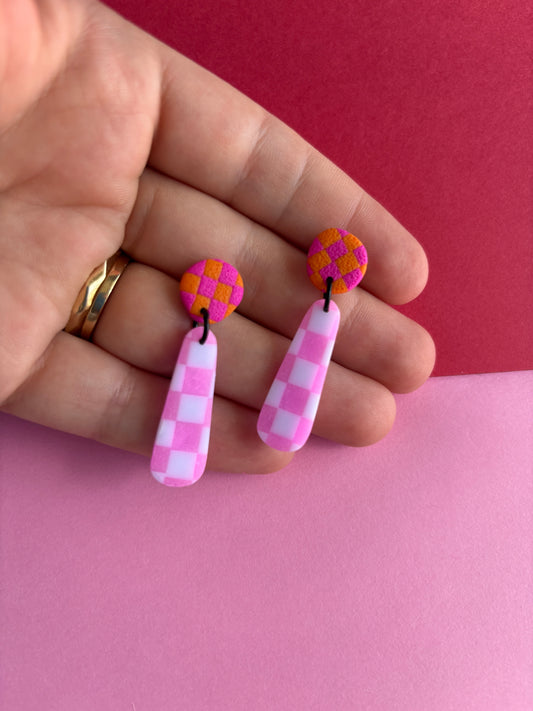 Checkered drop dangles, orange and pink