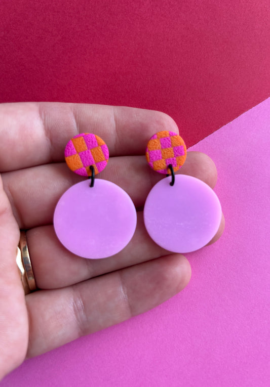 Checkered button dangles